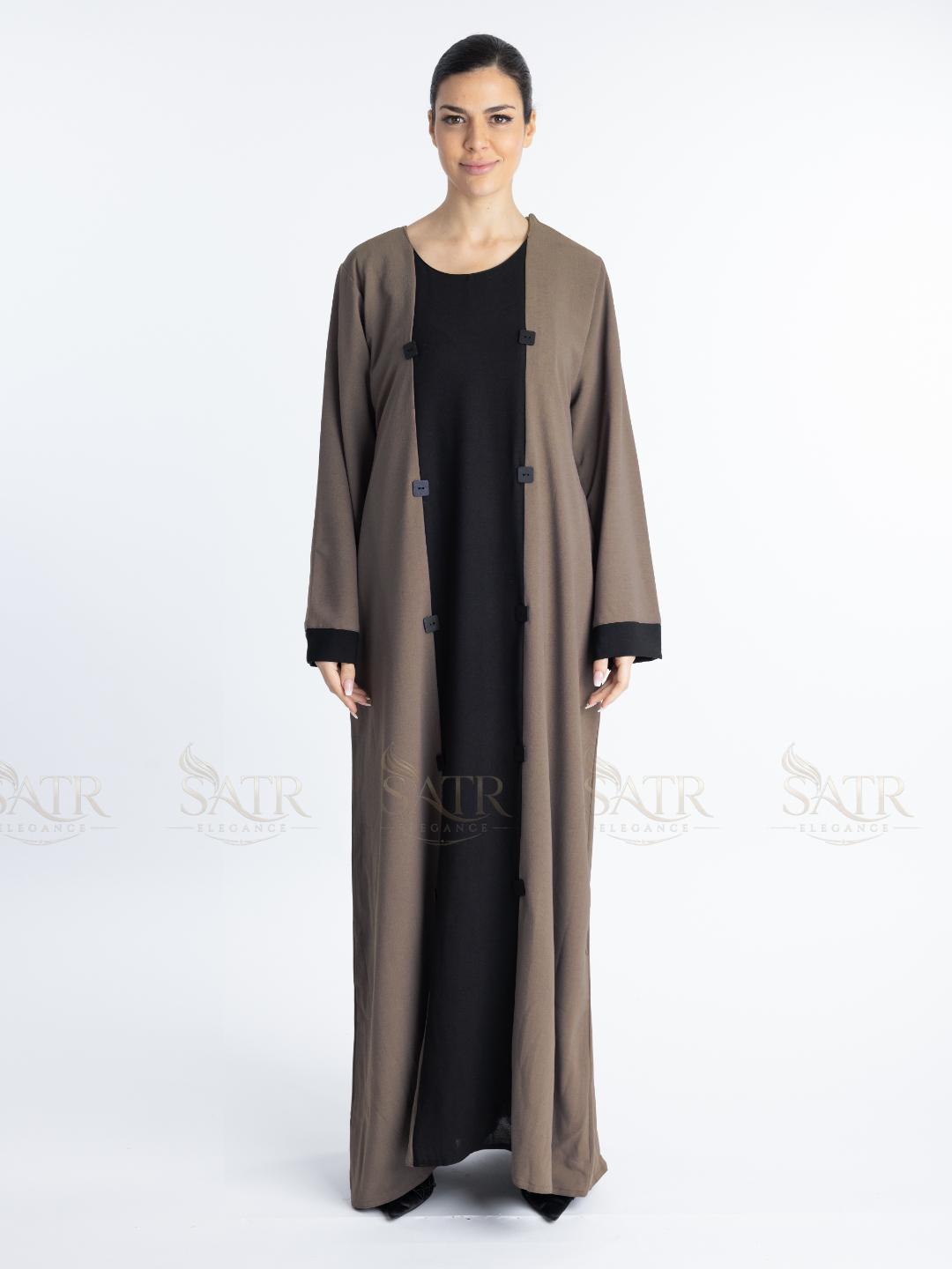 Women with dual tone Abaya black in middle and brown on both sides with white background. Clean and elegant look for casual occasions.