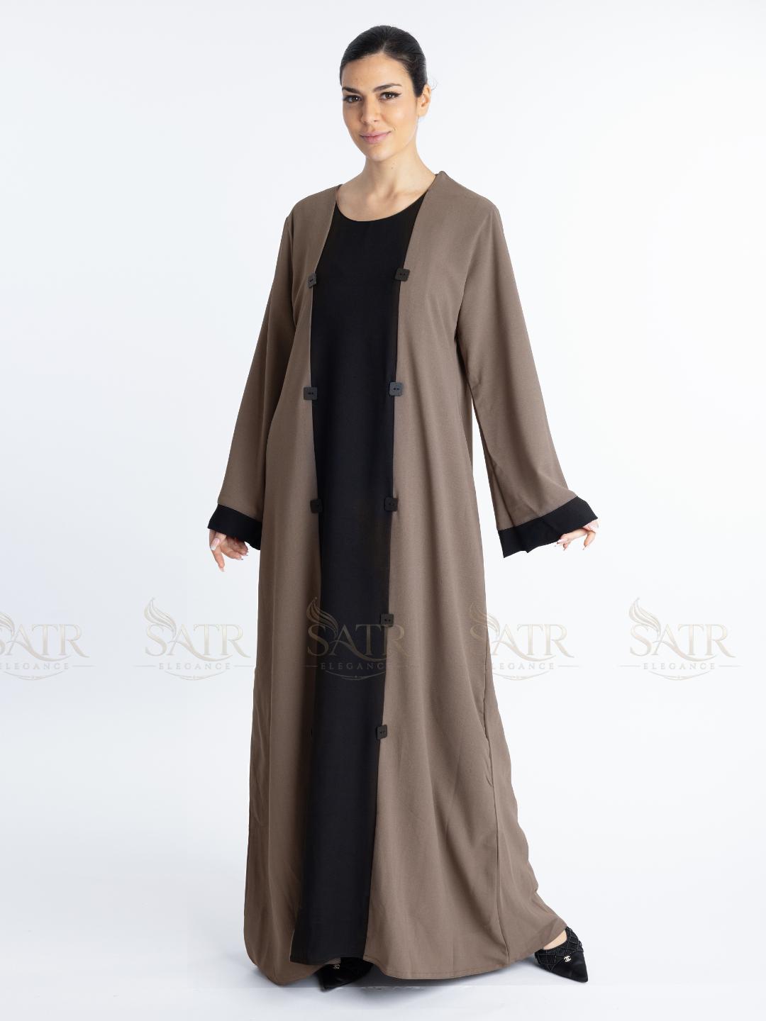 Women with dual tone Abaya black in middle and brown on both sides with white background. Clean and elegant look for casual occasions.